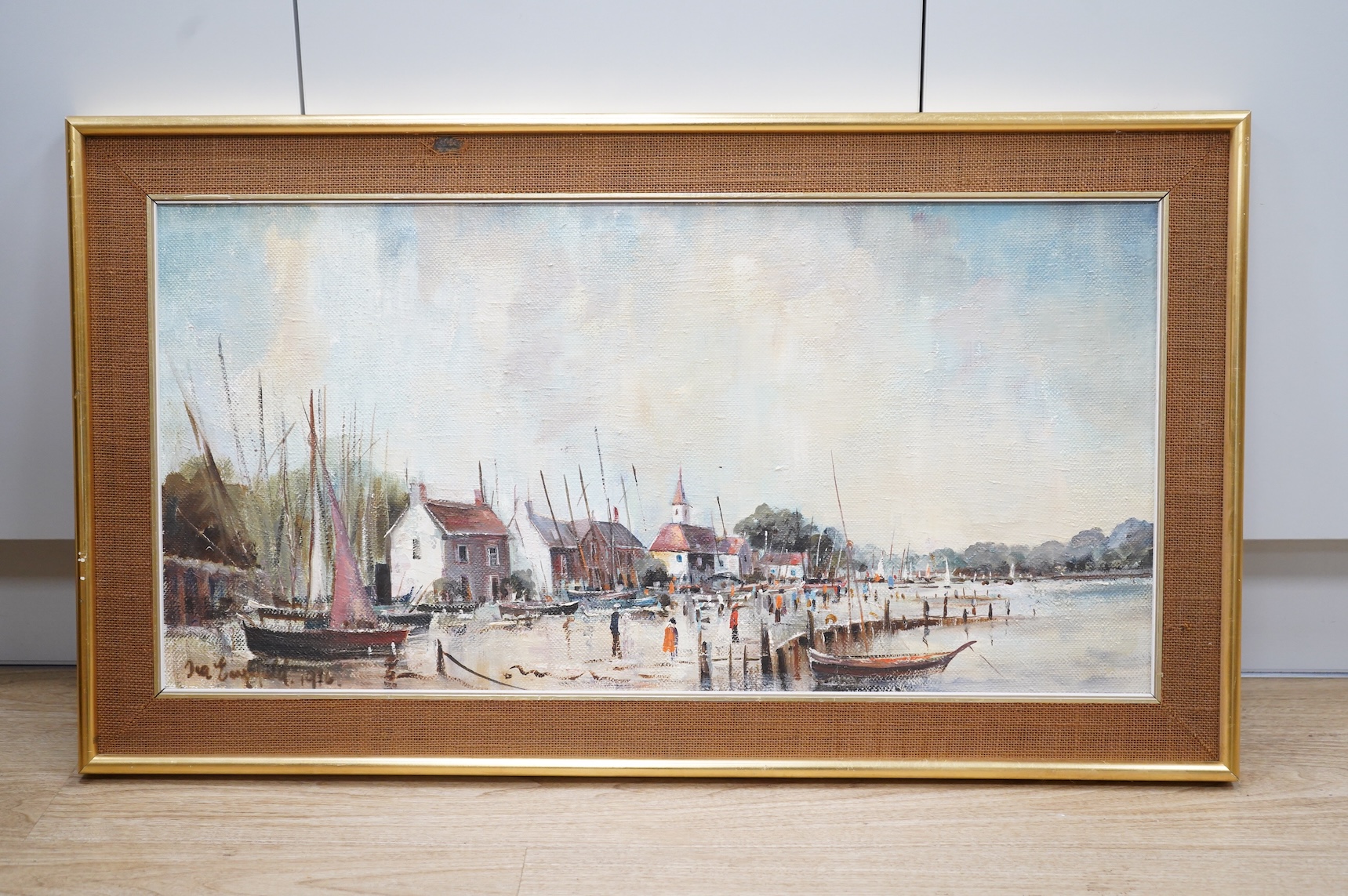 Ira Englefield (b.1912), Harbour view with moored fishing boats, signed and dated 1976, oil on canvas, 39 x 80cm